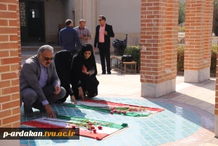 غبار روبی وعطر افشانی قبر شهدای گمنام آموزشکده فنی وحرفه ای شهدبهشتی اردکان 4
