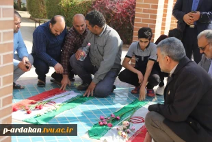 مراسم سالگرد خاکسپاری شهدای گمنام آموزشکده  فنی وحرفه ای شهید بهشتی اردکان با حضور حجت الاسلام دهباشی مسئول عقیدتی سیاسی پادگان هوا فضای اردکان (حضرت ولی عصر) ، دانشجویان وهمکاران مرکز 2